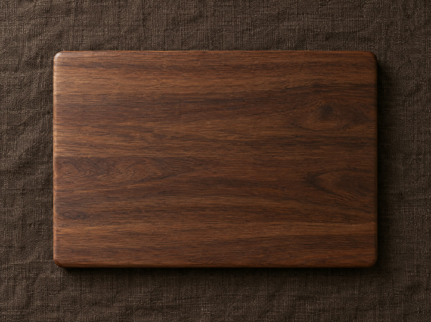 Preview of your design engraved on a walnut cutting board